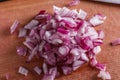 Red onion cut on a wooden board