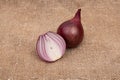 Red onion heads on old burlap