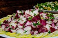 A large plate of red onions