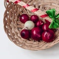 Red onion and white onion brown wicker basket Royalty Free Stock Photo