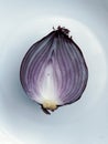 Red Onion on White Plate Royalty Free Stock Photo