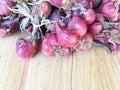 Red onion on wood board closeup