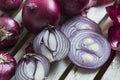 Red Onions on a rustic wooden borad