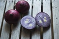 Red Onions on a rustic wooden borad