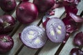 Red Onions on a rustic wooden borad