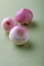 Red onions on wooden board Royalty Free Stock Photo