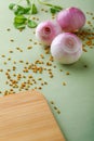 Red onions on wooden board Royalty Free Stock Photo