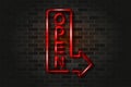 Red open arrow glowing neon sign or glass tube on a black brick wall. Realistic vector art