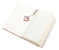 Red open notepad (paper) with heart bookmark