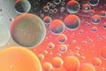 Red and orange abstract defocused background picture made with oil, water and soap Royalty Free Stock Photo