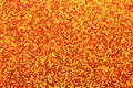 Red orange background. Abstraction shiny sequins. Sequins texture closeup macro Royalty Free Stock Photo