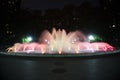 Red and orange colored water fountain at night Royalty Free Stock Photo