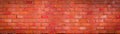 Red orange damaged rustic brick wall brickwork stonework masonry texture background banner panorama pattern Royalty Free Stock Photo