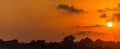 Red and orange dramatic colorful clouds lit by evening sunset light Royalty Free Stock Photo