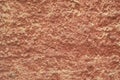 Red-orange painted wall with cinder block texture. Abstract interior background Royalty Free Stock Photo