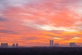 Red and orange sky over city park and towers Royalty Free Stock Photo