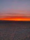 Red-orange sunset, romantic mood, beach and sea Royalty Free Stock Photo
