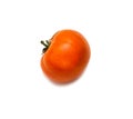Red-orange tomato on a white background. Isolated Royalty Free Stock Photo