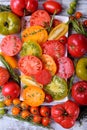 Assortment of sliced and whole tomatoes Royalty Free Stock Photo