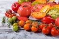 Assortment of sliced and whole tomatoes Royalty Free Stock Photo