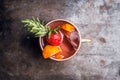 Red oranges and strawberry cocktail in copper mug variation of Moscow mule on the wooden background Royalty Free Stock Photo