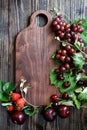 Red Organic Homegrown Fruit and Cutting Board Royalty Free Stock Photo