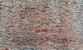 Outdoor stone wall with uneven rough bricks and textured surface Royalty Free Stock Photo