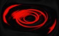 Red oval shapes spinning on black background Royalty Free Stock Photo