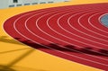 red padded rubber sport and running track floor detail. athletics stadium closeup