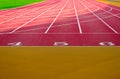 red padded rubber sport and running track floor detail. athletics stadium closeup