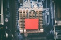Red padlock on computer motherboard cooling cpu chip. Internet data privacy information security concept. Toned image. Royalty Free Stock Photo