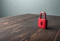 A red padlock. preservation of secrets, information and values. Protection, insurance and hacking attack concept. Royalty Free Stock Photo