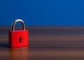 A red padlock. preservation of secrets, information and values. Protection, insurance and hacking attack concept. Royalty Free Stock Photo