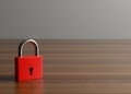 A red padlock. preservation of secrets, information and values. Protection, insurance and hacking attack concept. Royalty Free Stock Photo