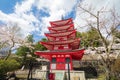 Red pagoda in cherry blossom sakura in spring season, Fujiyoshida, Japan. Royalty Free Stock Photo