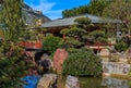 Red pagoda and a small lake in the Japanese Garden or Jardin Japonais in Monaco, Monte Carlo Royalty Free Stock Photo