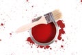 Red paint can with brush and color stains Royalty Free Stock Photo