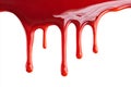 Red paint drip glossy liquid white background closeup gravity flow abstract detail wet texture splash pattern dynamic motion Royalty Free Stock Photo