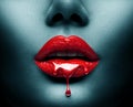 Red Paint dripping, lipgloss drops on sexy lips, bright liquid paint on beautiful model girl`s mouth, Vampire. Halloween. Lipstick Royalty Free Stock Photo