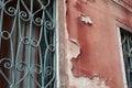 Red paint peeling of an old house, Venice, Italy Royalty Free Stock Photo