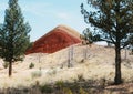 Red painted hill in Oregon under clear sky Royalty Free Stock Photo