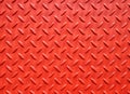 Red painted industrial metal plate industrial diamond pattern grip texture