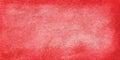 Red painted metal texture in abstract background design, lots of closeup pitted grunge