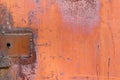 Red painted surface of metal sheet with traces of rust. Abstract background Royalty Free Stock Photo