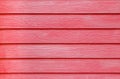Red painted wood grain fiber cement board texture background