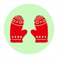 Red pair of warm Christmas mittens icon circle sticker on green colours background vector illustration. New Year mitten