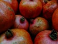 Red pamogranate taking close-up on group selling at the market