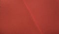 Red paper background hard texture in trendy colors