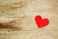 Red paper heart on grunge wooden background Royalty Free Stock Photo