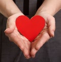 Red paper heart on the hands Royalty Free Stock Photo